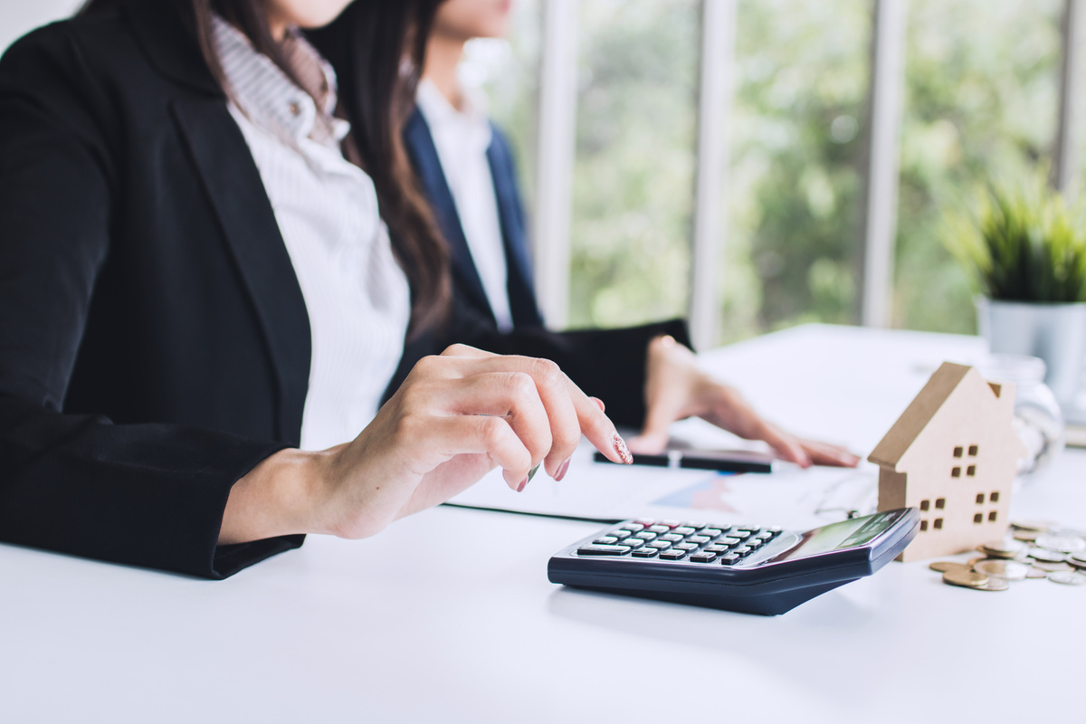 Banker Agency Calculate Finance with Calculator, Real Estate and